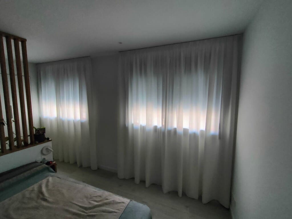 Instalación cortina en barra Topi Lleida